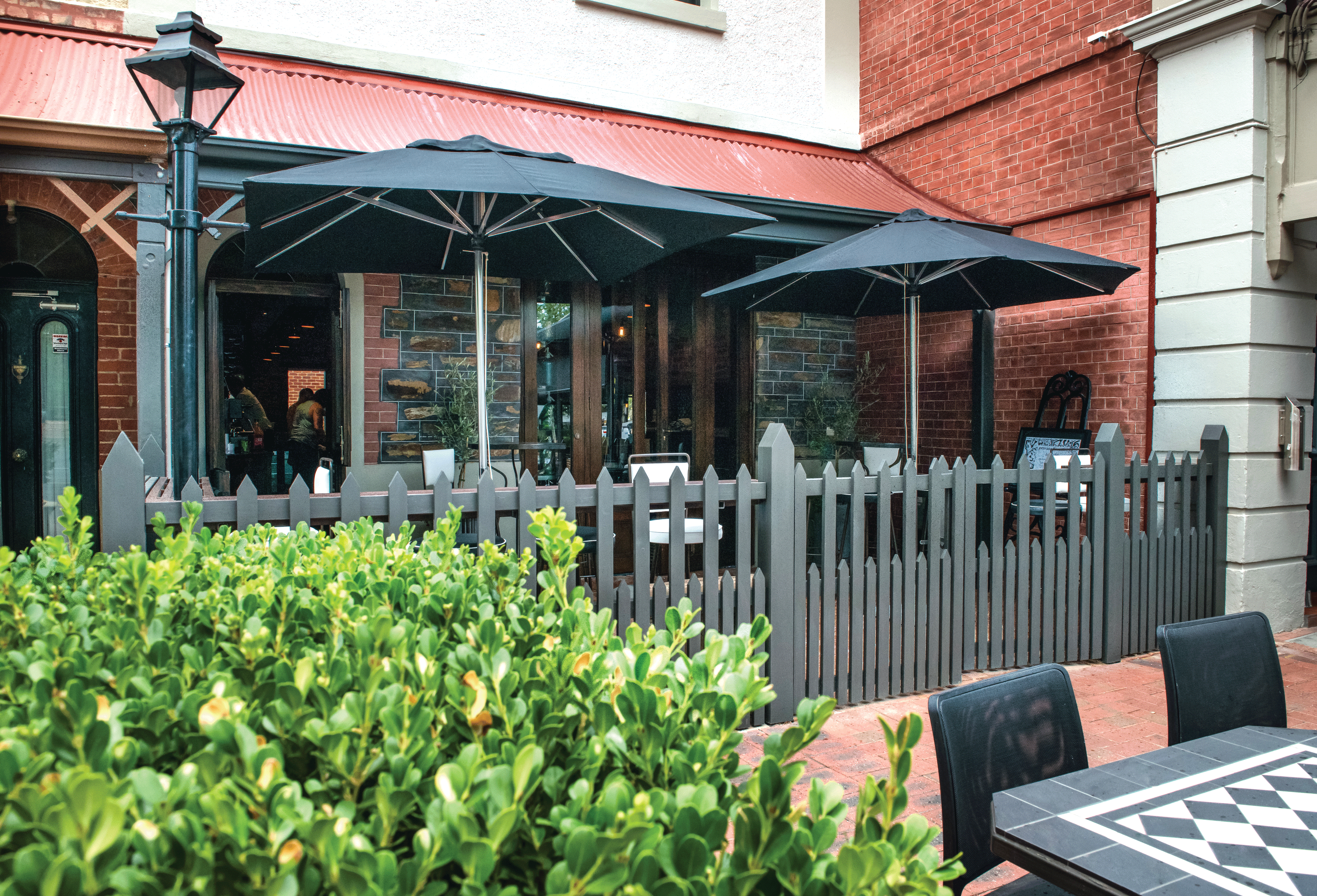 Adelaide's new Bar Torino has a warm, European feel with whitewashed walls, black tiles and lots of rustic, wooden tones.
